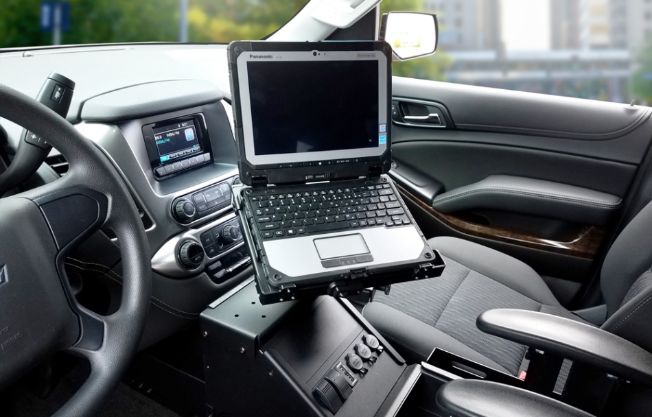 Panasonic Toughbook 20 laptop docking station mounted on Mongoose motion attachment in Chevy Tahoe