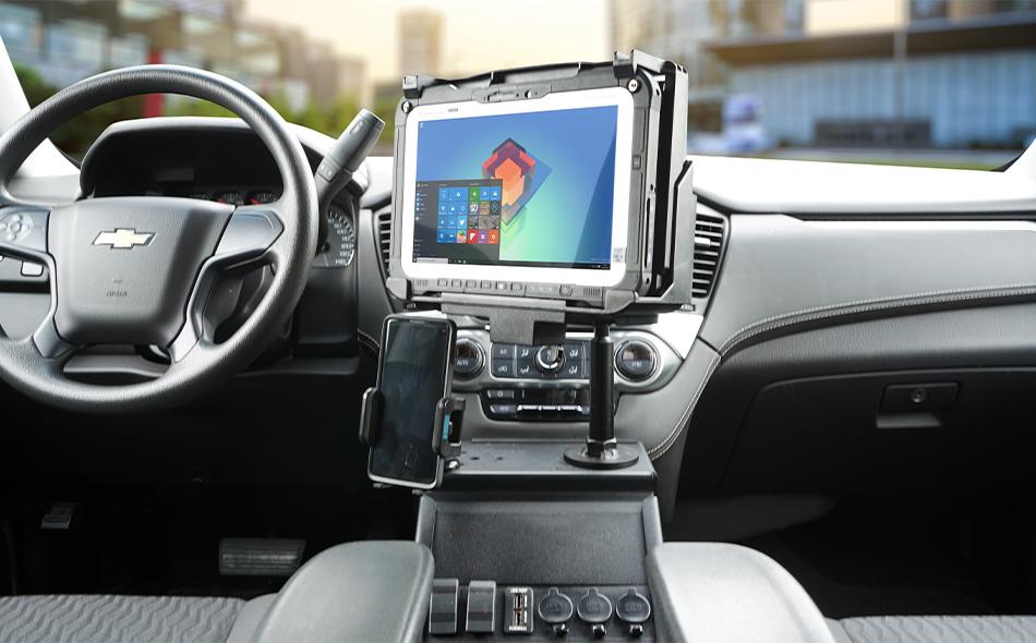 2015+ Tahoe vehicle specific console with Zirkona phone mount and Zirkona console tablet display holding a Panasonic G1 docking station