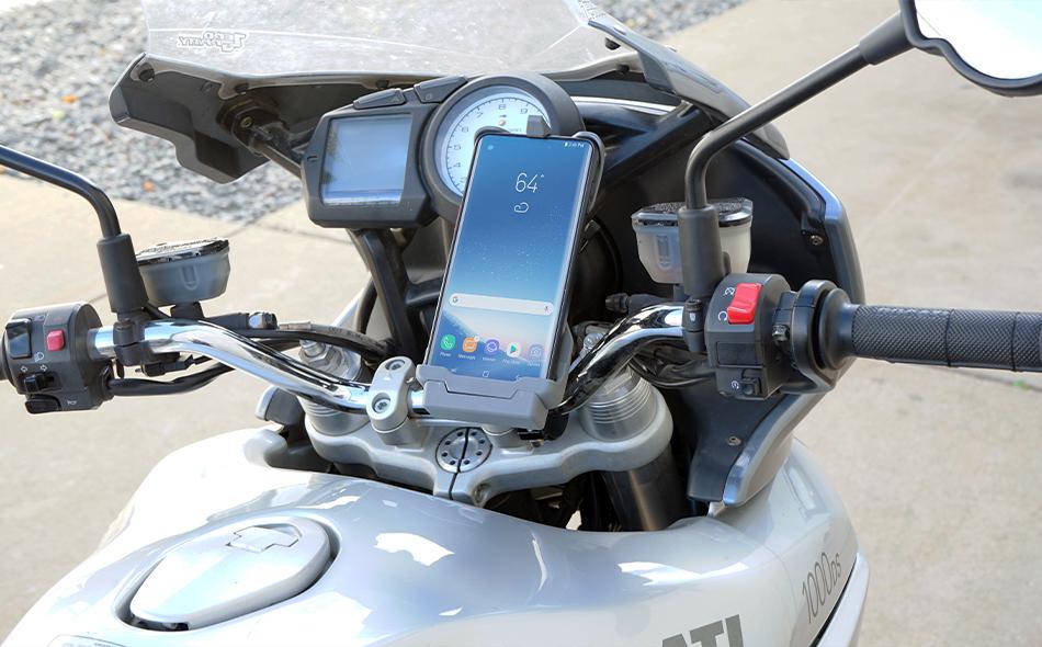 Samsung Galaxy XCover Pro Charging Cradle (7160-1488) mounted to a Motorcycle with a Round Clamp