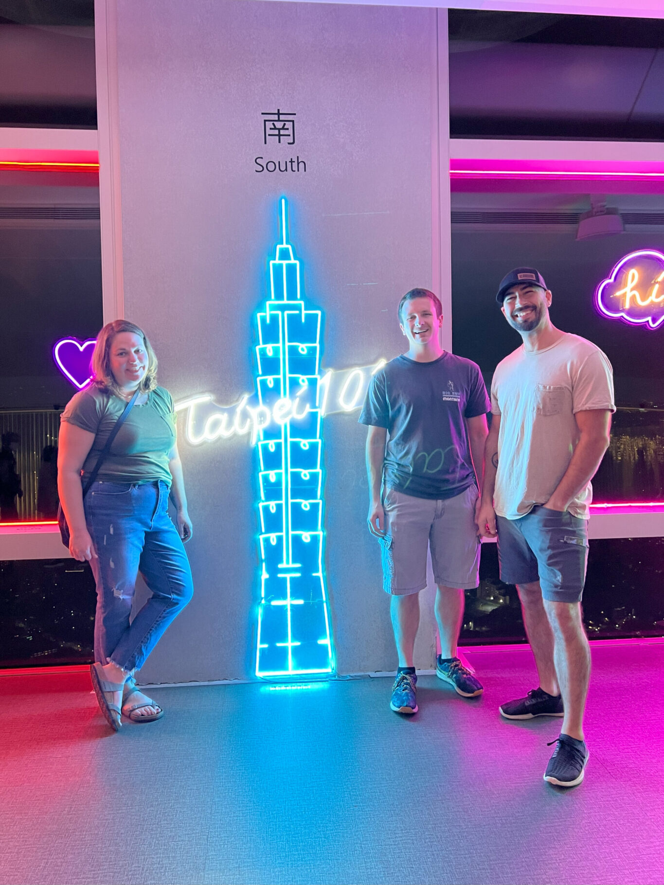 Zach Darrell and Sarah - neon sign - Taipei 101 tower