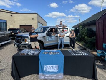 Gamber-Johnson team members manning a booth