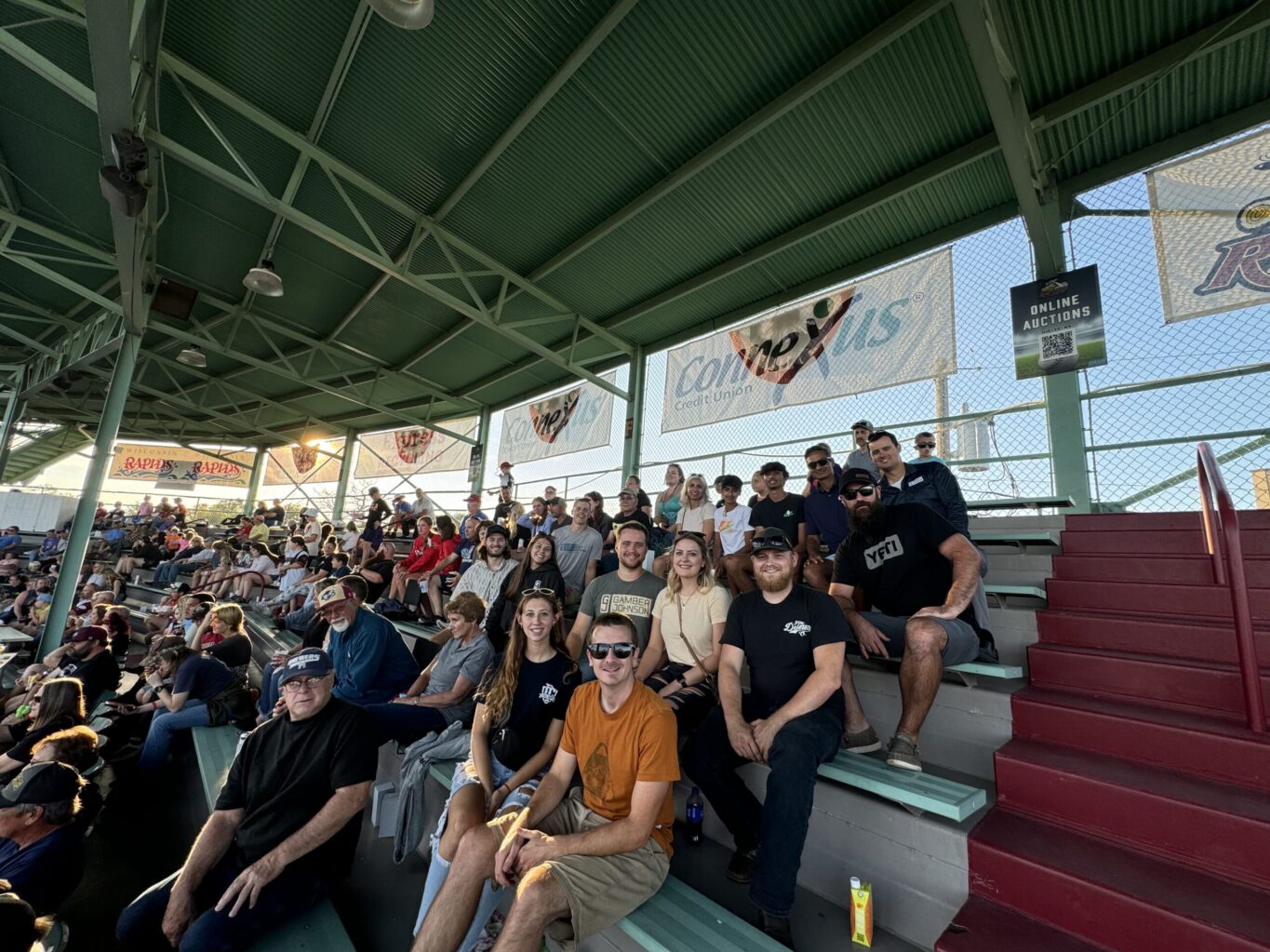Gamber-Johnson team members at a baseball game