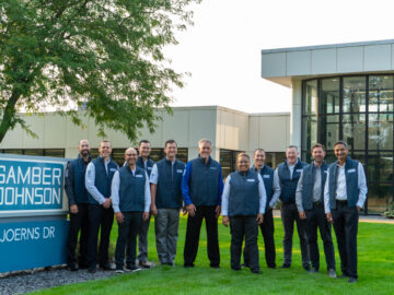 Executive Team for Team Gamber-Johnson standing outside GJ HQ