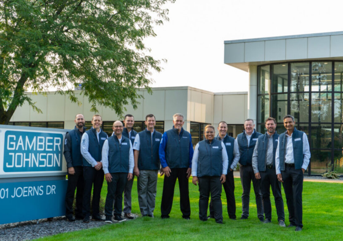 Executive Team for Team Gamber-Johnson standing outside GJ HQ