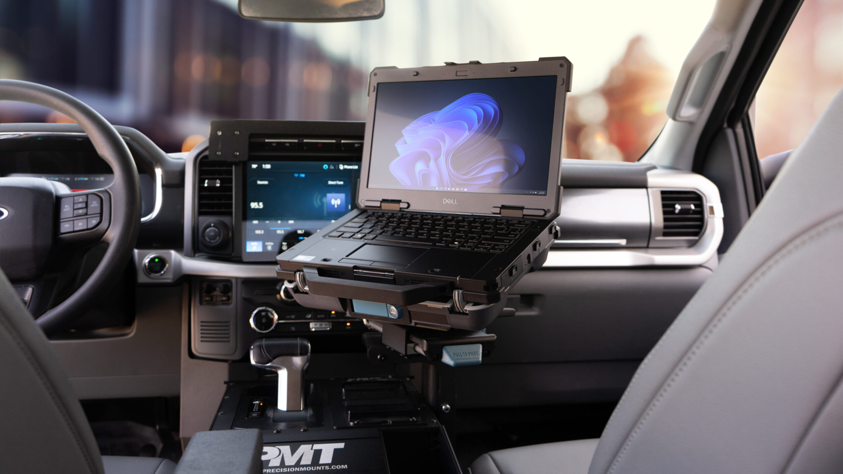 Dell Rugged Laptop Dock from Gamber-Johnson in a ford police vehicle