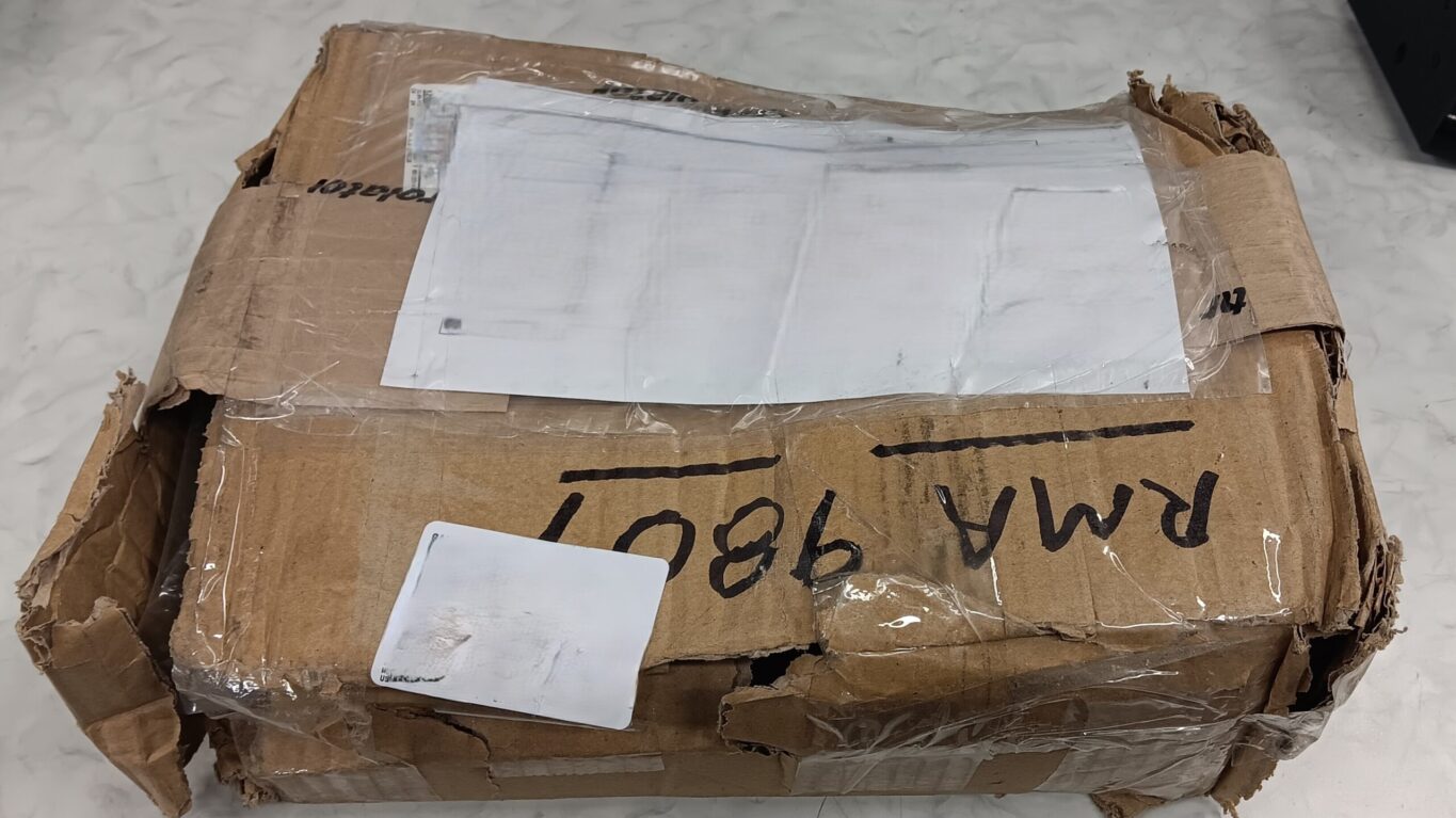 items in a busted box with incorrect packaging