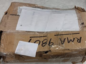 items in a busted box with incorrect packaging