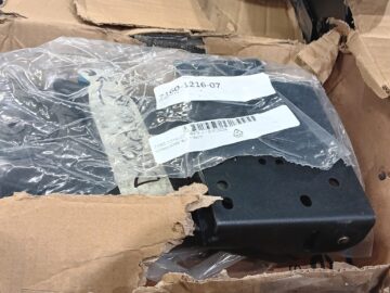items in a ripped box with incorrect packaging